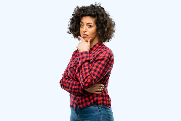 istock Beautiful arab woman doubt expression, confuse and wonder concept, uncertain future 1044358026