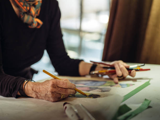 istock Senior woman artist at work 1044360888