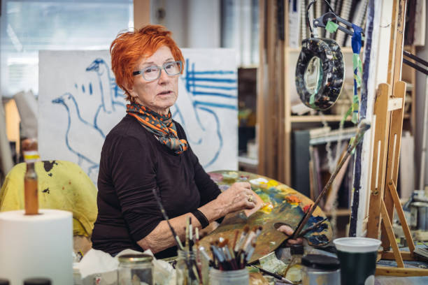 istock Senior woman artist at work 1044360948