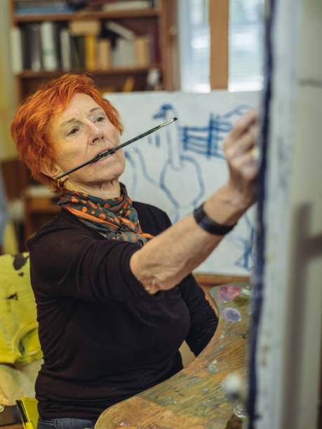 istock Senior woman artist at work 1044367000
