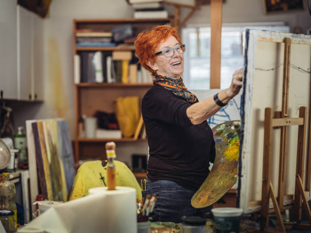 Senior woman artist at work