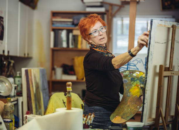istock Senior woman artist at work 1044371208
