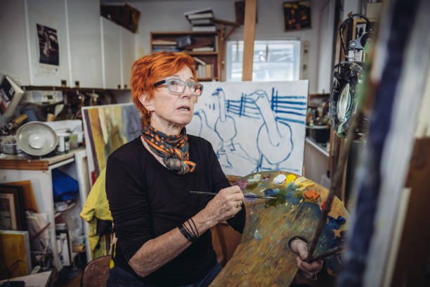 istock Senior woman artist at work 1044372460