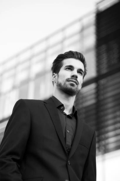 istock Businessman standing in front of office building 1044372982
