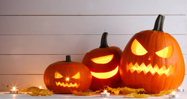 istock Halloween pumpkin and candles 1044378020