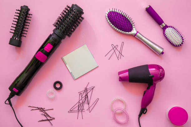 istock Professional hairdressing tools, pink background 1044381412