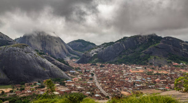 Idanre Hills Idanre Hill , an awesome and beautiful natural landscapes in Nigeria.
The people people of Idanre lived on these massive rocks for over a hundread year. Just under 30 kilometres southwest of Akure, Ondo State capital, the ancient Idanre Hills had been a home for the Idanre people for over 100 years.
The hills surround the town, envelope it and dominate life in the town. From any angle, one sees the hills and virtually every activity revolves round this collection of hills nigeria stock pictures, royalty-free photos & images