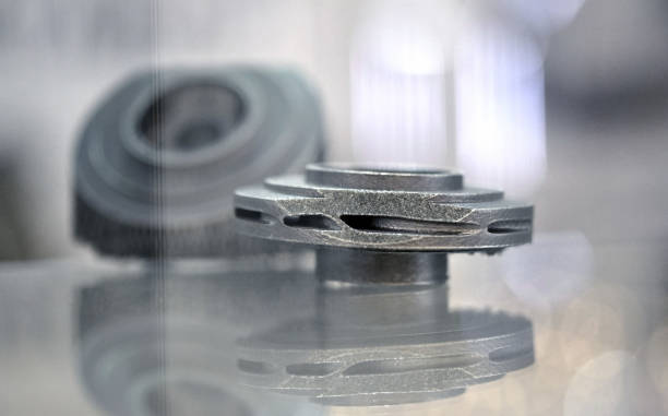 istock Selective Laser Melting. Object printed on metal 3d printer close-up. 1044395082