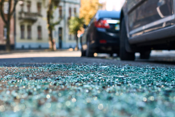 Shards of car glass on the street stock photo
