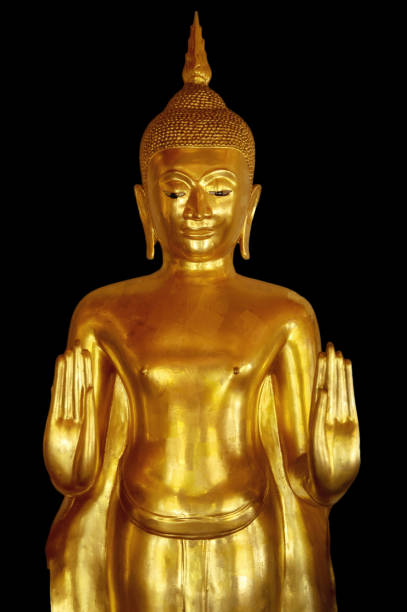 istock Golden buddha isolated on the black background 1044399892