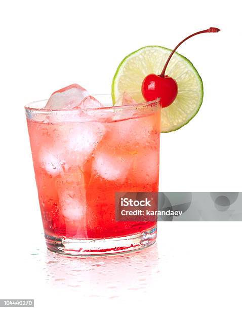 Alcohol Cocktail With Maraschino And Lime Stock Photo - Download Image Now - Cut Out, Maraschino Cherry, Cherry