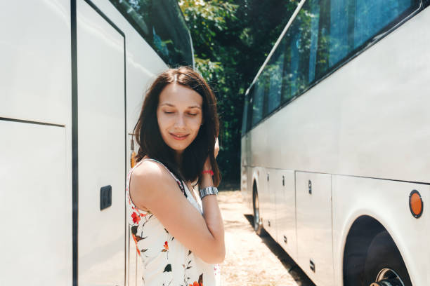 istock girl near bus 1044405486