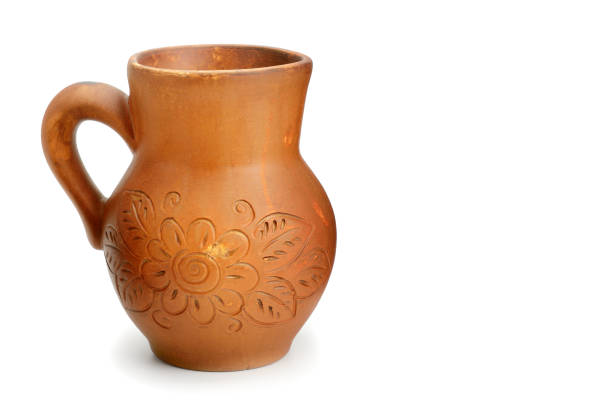 istock Beautiful clay pot isolated on white background. 1044414234
