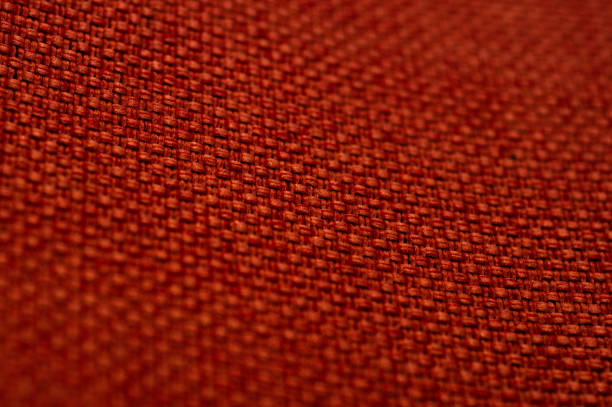 istock burgundy fabric texture background, silk fabric texture, textile industry background with blurred, Colored cotton fabric, Macro 1044417916