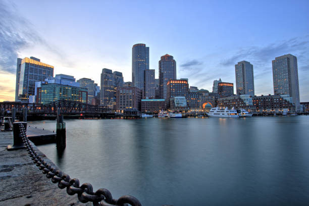 istock Boston Skyline with Financial District and Boston Harbor at Sunset 1044425808