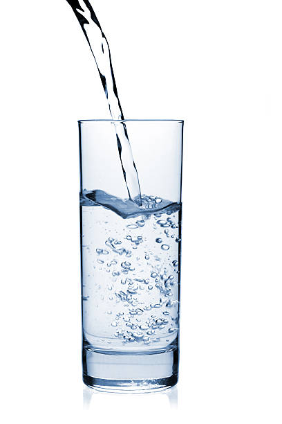 istock Water is poured into a glass 104442691