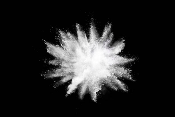istock White powder explosion isolated on black background. 1044429702