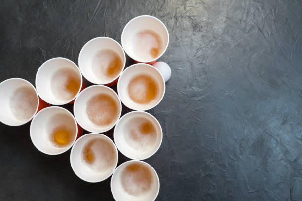 istock Beer pong. Popular game at parties. Place for your text. 1044448870