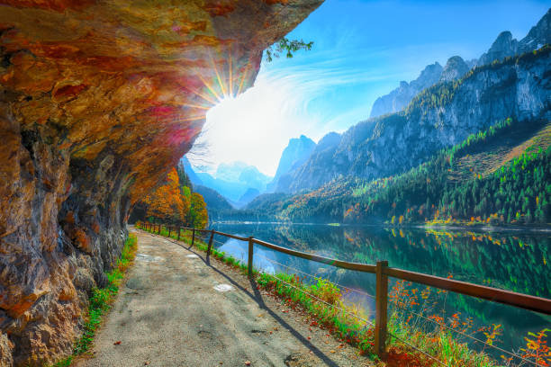 istock colorful autumn scenery with Dachstein mountain summit by Gosausee mountain lake 1044459754
