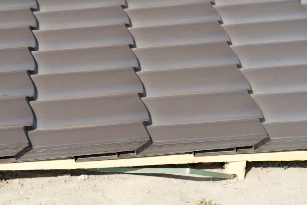 istock roofing material is waiting for installation on the roof. 1044460282