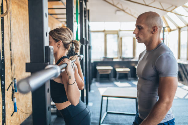 istock Showing woman how to train 1044460558