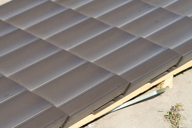 istock roofing material is waiting for installation on the roof. 1044463440