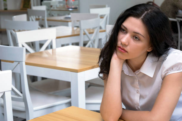 istock Dreamy girl at workplace 1044464432