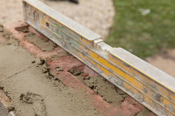 istock House construction wet cement with clay brick laying 1044469032