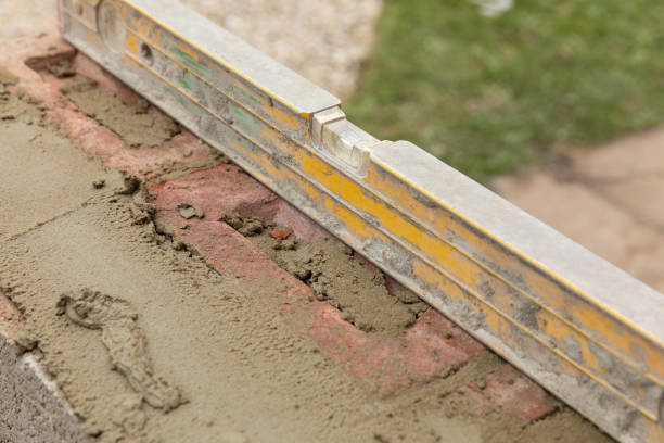 istock House construction wet cement with clay brick laying 1044469046