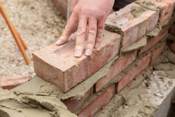 istock House construction wet cement with clay brick laying 1044469056