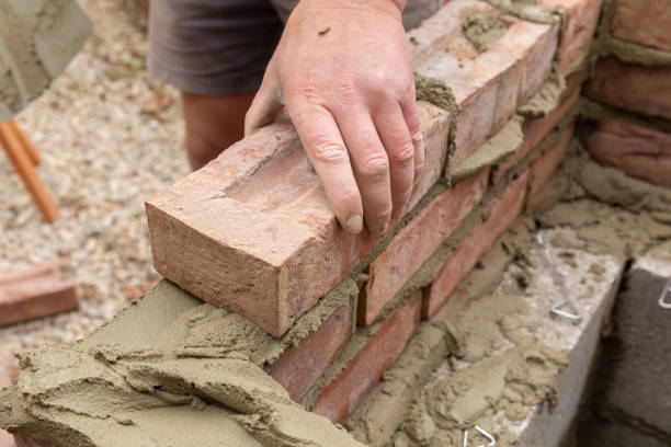istock House construction wet cement with clay brick laying 1044469064