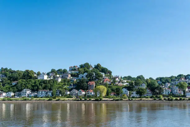 panoramic view of Hamburg Blankenese on sunny day as seen from Elbe river