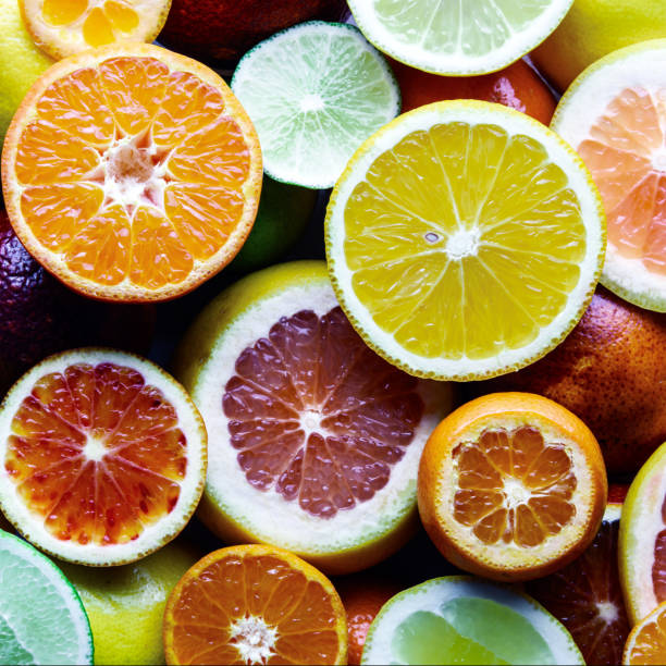 istock Mix of different citrus fruits closeup 1044469812
