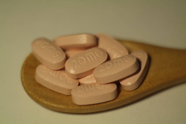 istock close up pink pill and medicine 1044482516