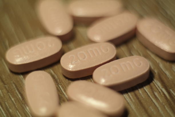 istock close up pink pill and medicine 1044482554