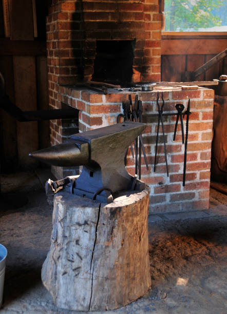 istock Anvil in Blacksmith Shop on Tree Stump 1044490752