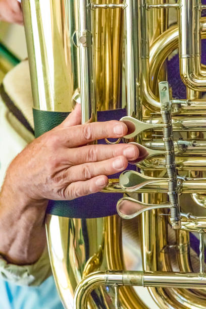 istock finger of tuba player 1044495328