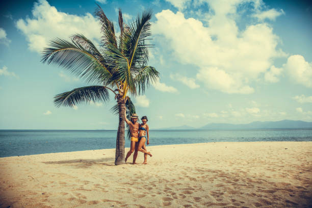 istock Couple on tropical beach 1044528052