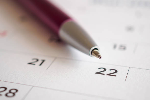 Calendar page with pen point at 22nd date