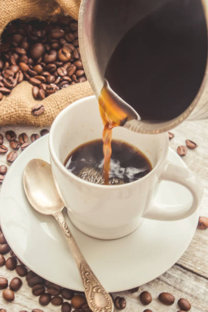 istock coffee bean. a Cup of coffee. selective focus. 1044535334