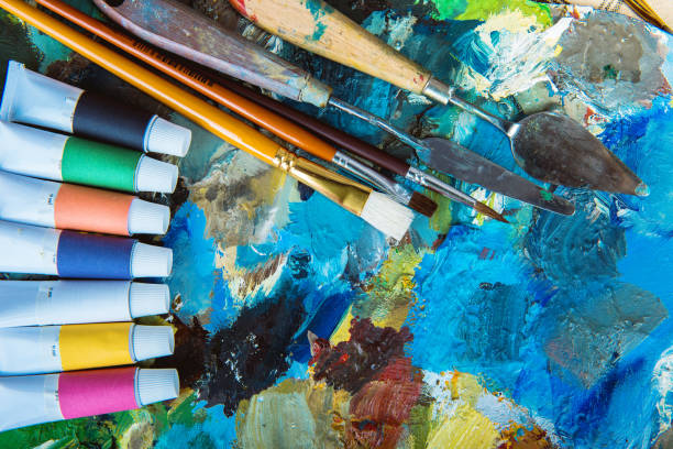 istock oil paints, palette, art paint brushes 1044539020