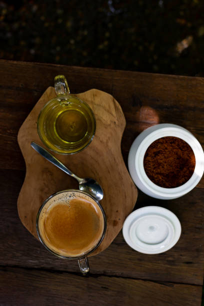 istock Coffee and tea are on the wooden table 1044560334