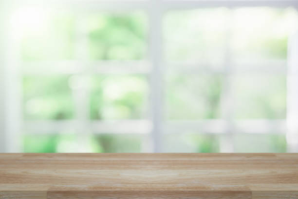 istock Empty wooden table and window room interior decoration background, product montage display,can be used for display or montage your products.Mock up for display of product. 1044567964