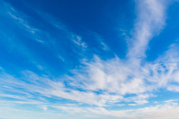 istock Bright sky blue background. Sky in daylight with beautiful white cloud. 1044568006