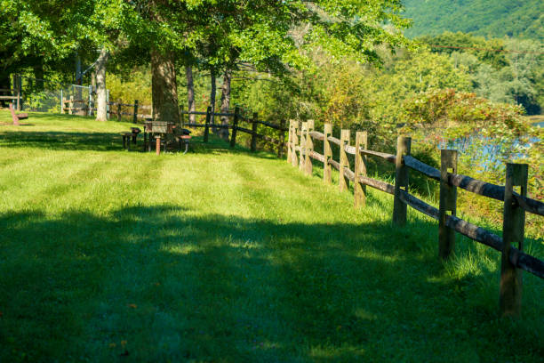 istock Split rail wood fence in park 1044592246
