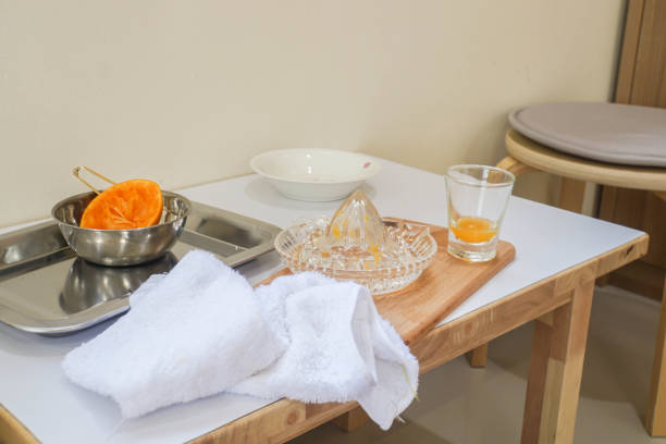 istock squeeze tool with fresh orange peels for healthy drink 1044592454