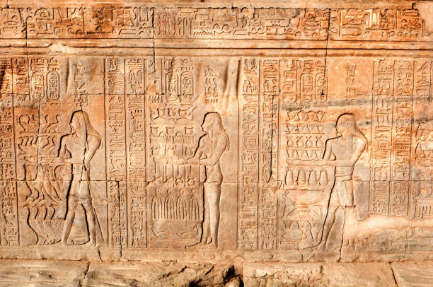 Frescos and hieroglyphs on the Egyptian wall