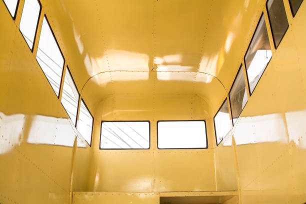 istock Retro bus inside, old public transport interior not with leather seats in row 1044623988