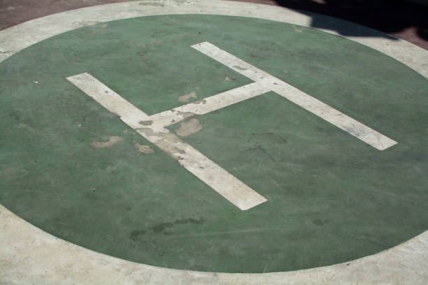 istock symbol landing pad. helicopter parked mark on the asphalt 1044626586