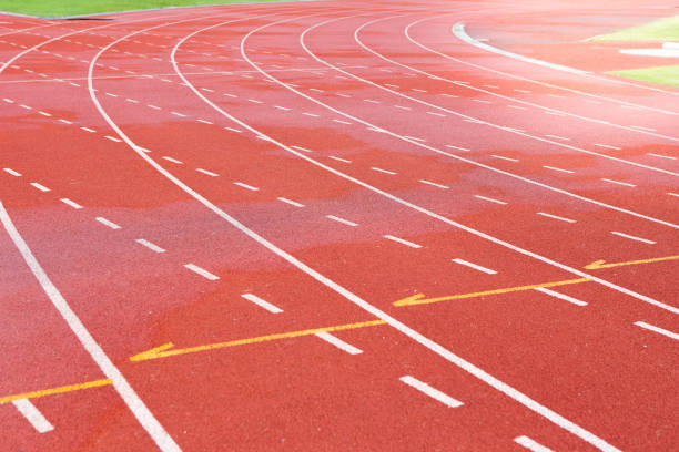 istock Red Track in the stadium background 1044626964